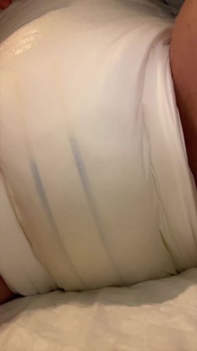 Trans boy pees in wet diaper during watersport fun