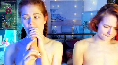 Teen camgirls Sadie and Evelyn lick, kiss and climax during a steamy live lesbian show from their shared bed