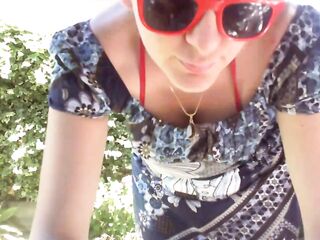 Nicoletta sunbathes in a public garden wearing a large smutty diaper