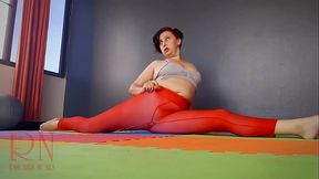 Regina Noir. A woman in yoga leotards practices yoga in the gym. Transparent red leotard yoga. Pantyhose 125 C1