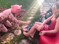 Foot slave being taught servitude and obedience outdoors