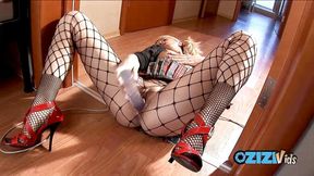 Masturbating blonde in fishnets enjoys her enormous dildo