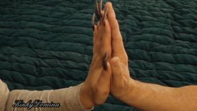 Comparing hands with the queen of long nails