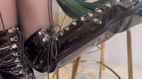 Seamy MILF teases with black pantyhose and leather boots