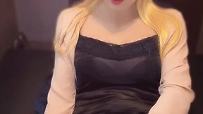 Beautiful blonde woman self-pleasuring on camera