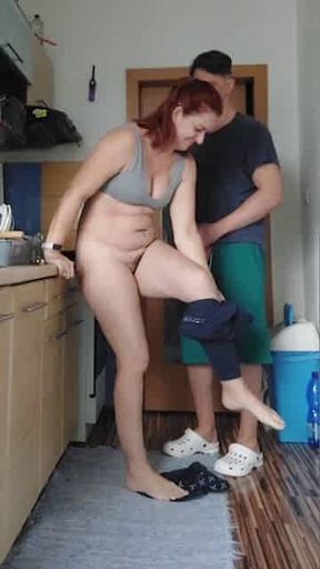 Housewife fucks in the kitchen