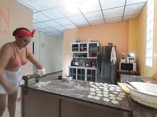 Nudist housekeeper Regina Noir cooking at the kitchen. Stripped maid makes dumplings. Undressed cooks. Brassiere 1