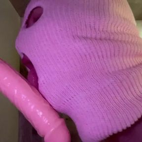 Sissy sucks big dildo in pink mask