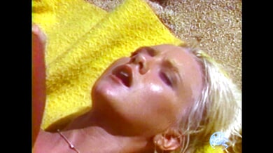 Stephanie Rage takes Peter North deep on the beach in vintage outdoor heat
