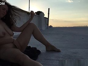 Amazing girl making a homemade masturbation video on a rooftop