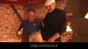 Turists old men threesome with bimbo american blonde in a pub