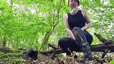 Just a very well stuffed corseted slut playing with a vibrator in the woods....