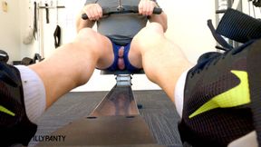 Straight guy rides the rower in the hotel gym with his cock out