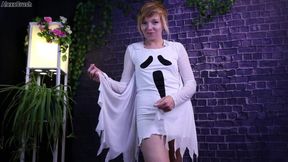 Sexy girl with short hair in a Halloween costume dominates her good boy