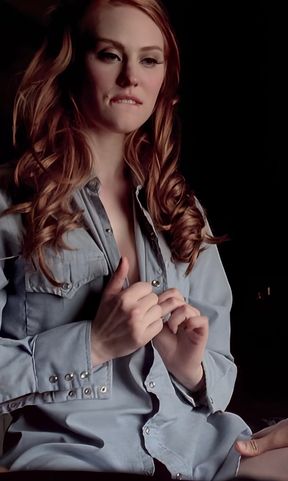 Hot redhead celebrity Deborah Ann Woll shows off her bra and tits