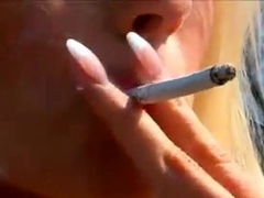 Sexy UK Blonde In Leather Smoking