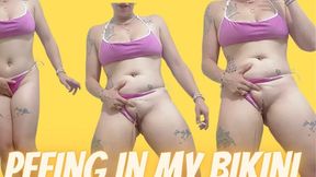 Peeing in a new pink bikini