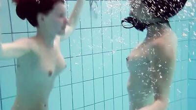 Fun naked girls get naughty in the pool