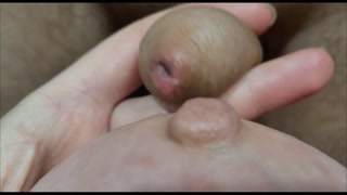 Playing with my strange, small penis. She seems to like it. I'm masturbating with my feet.