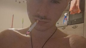Cute boy smokes first cigarette in your face