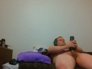 Chubby man slut jacks it, careful not to wake up room mate