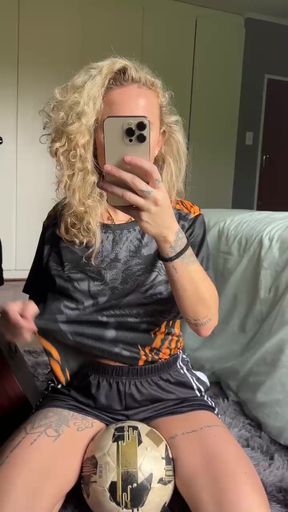 Busty football player shows off her boobs at the gym