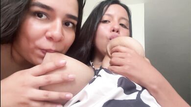 Milky lesbian milf gets her tits sucked till overflow