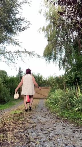 In an outfit with a polka dot dress for an evening.