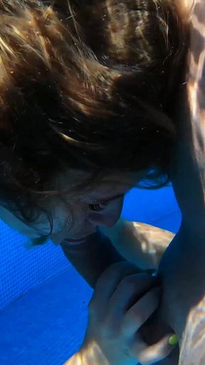 Insatiable MILF Rides Her Lover in the Pool