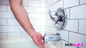 Tattooed milf gets banged hard in the bath