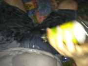 emptying bottle of piss on under armour clothes