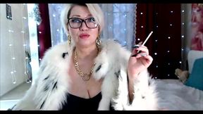 Sexy and pranks of a russian mature smoking bitch in a cool fur coat!