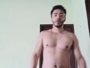 Guy working out bouncing his cock between his shorts ends up naked working out
