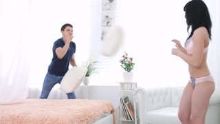 Pillow fight between lovers leads to passionate lovemaking