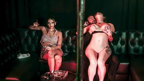Busty MILF stripper goes down on petite vixen