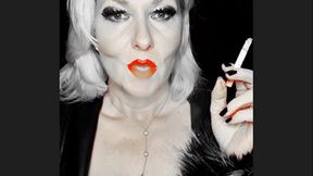 Smoker queen Joan pulls her marlboro red 100 very closly so sexy between her bright red juicy lips that glows just like her red bra