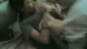 Cute giggling Malay brunette got her nice natural boobies sucked