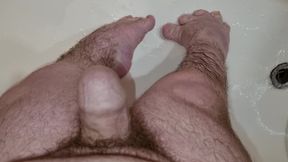 Midget shows his feet and then cums on them