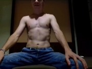 Very horny guy in jeans jerking off his cock