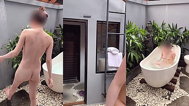 Bathing in an outdoor bath in a foreign country with old men and chickens nearby