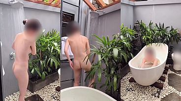 Bathing in an outdoor bath in a foreign country with old men and chickens nearby