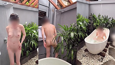 Bathing in an outdoor bath in a foreign country with old men and chickens nearby