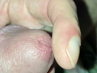 Squeezing and smearing a drop of precum, edging my cockhead gently