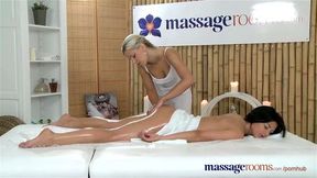 Massage Rooms Sexy blonde masseuse slips her fingers in young clients slit