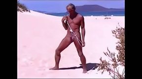 Tanned guy on beach in tiny string thong (temporarily!)