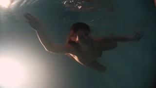 Babes swim and get naked underwater