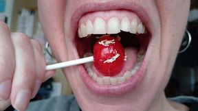 Lania sucks a candy full of tinies