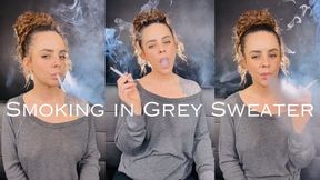 Smoking in Grey Sweater