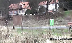 Sporty blonde gets down for a piss on the rocks