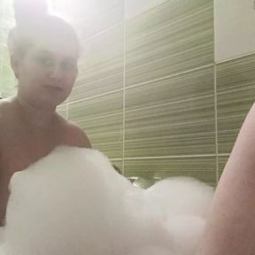 Couple take a bath and he touch her busty body